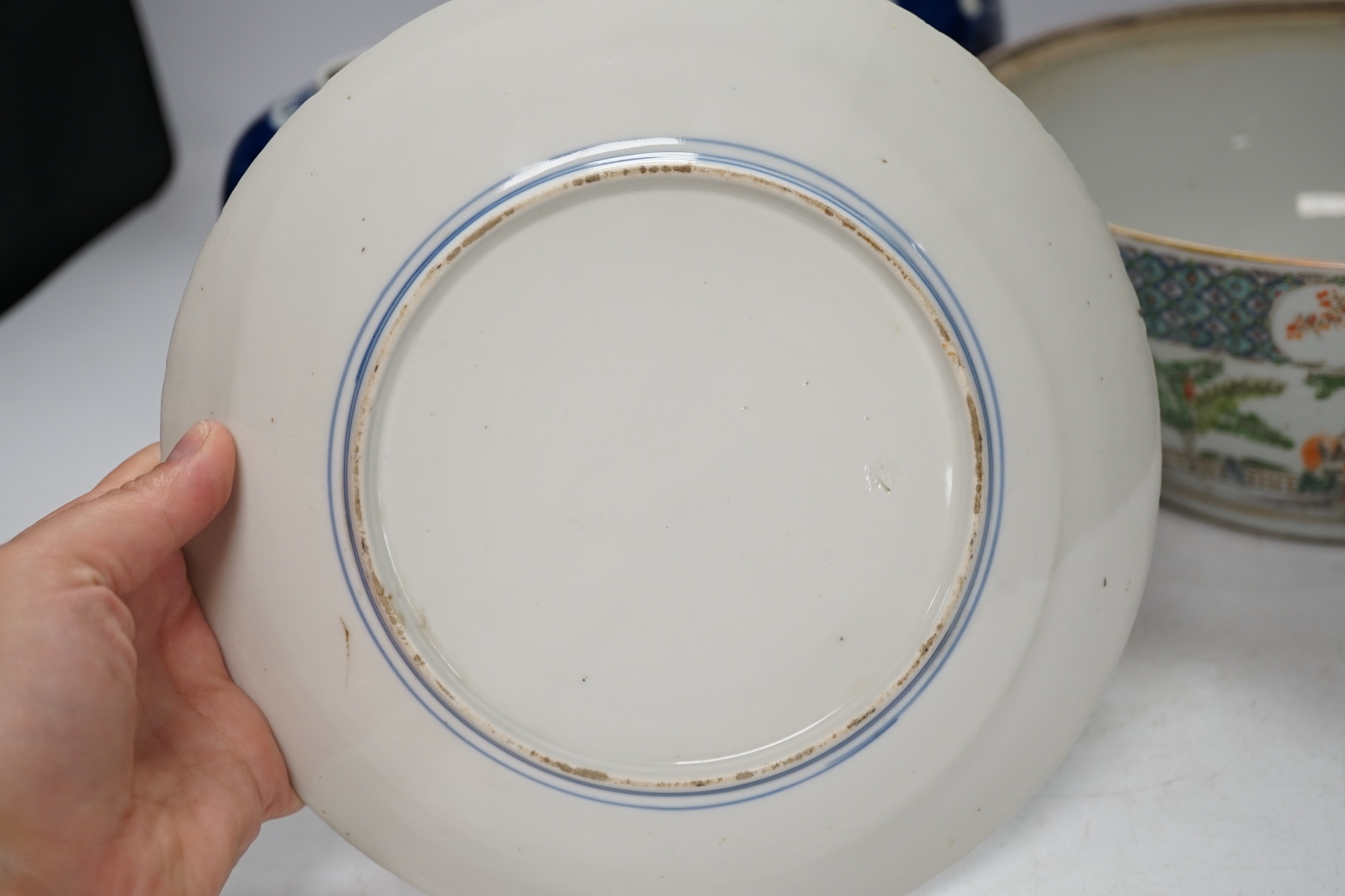 A 19th century Chinese famille verte handled bowl, missing cover, two blue and white prunus jars and an Imari dish, largest 28cm long. Condition - poor to fair